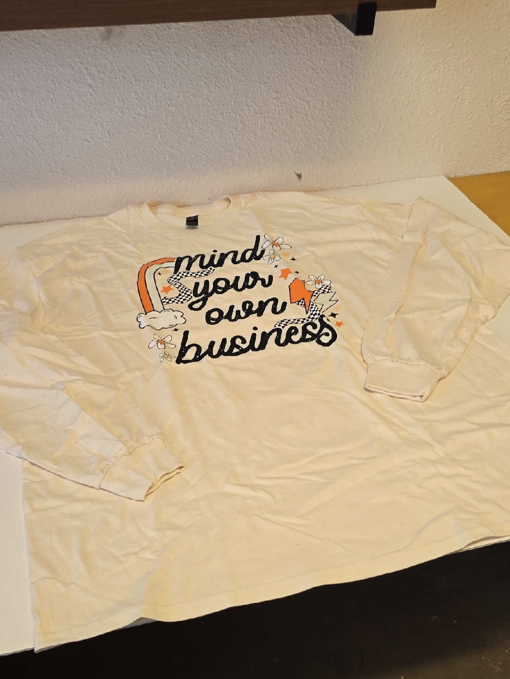 Gildan Cream Long-Sleeve "Mind Your Own Business" Graphic Tee